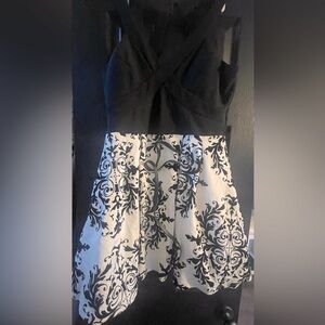 Black and white sleeveless dress.